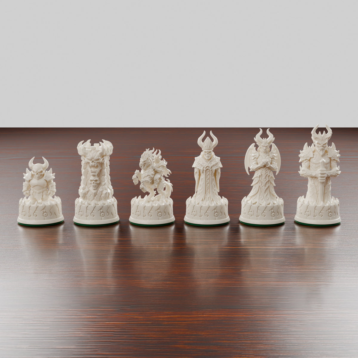 Pièces d'échecs démons claires alignées, du pion au roi